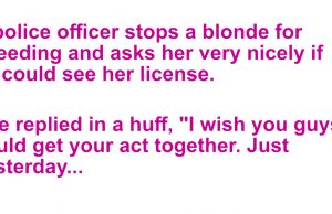 A police officer stops a blond