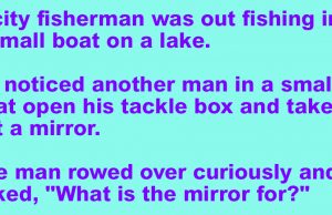 A city fisherman was out fishing on a lake