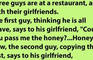 Three guys are at a restaurant with their girlfriends.