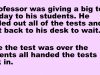 A professor was giving a big test one day to his students.
