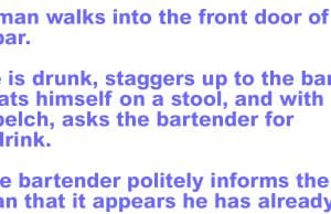 A man walks into the front door of a bar.
